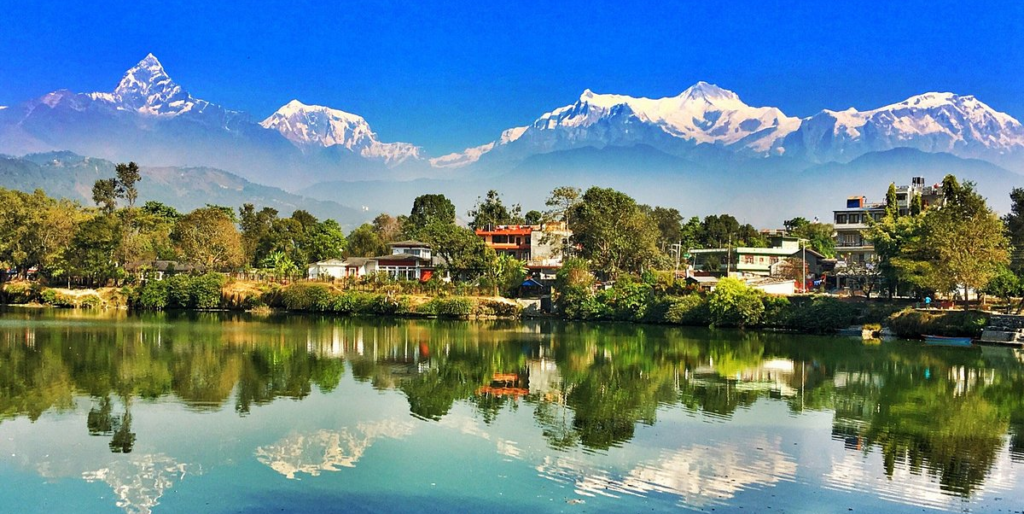 Travelers exploring the world’s best adventure places, including mountains, forests, oceans, and deserts full of thrill.